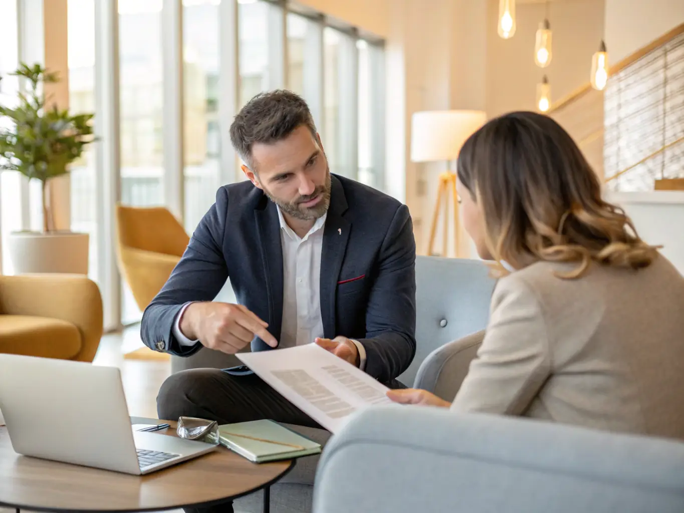 A D E Elite agent negotiating a property sale with a client in a modern office. The image should convey professionalism, trust, and a focus on achieving the best possible outcome for the client.